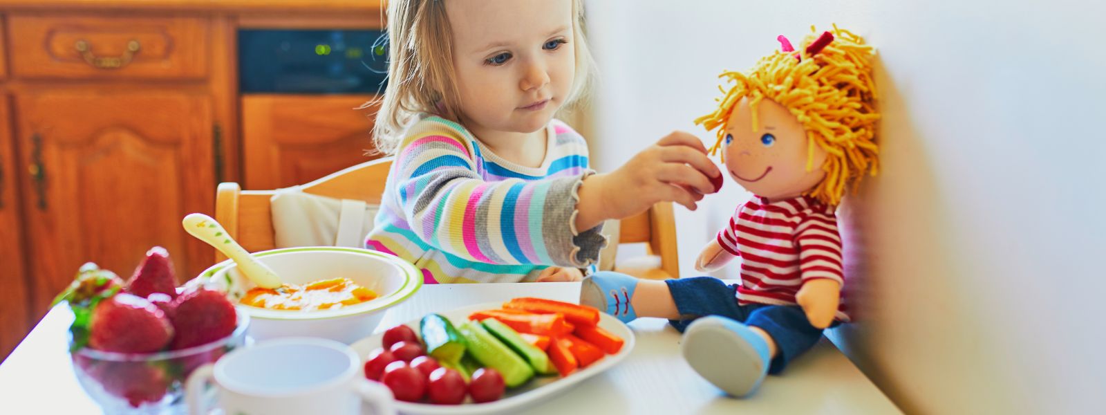 small child with food around their mouth